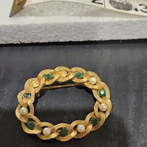 Elegant Gold and Green Brooch